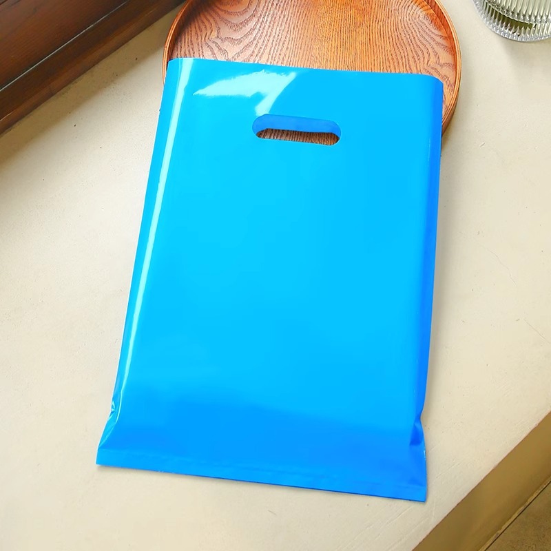 Bolsa de mano de tienda de ropa de grosor, bolsa de embalaje de ropa para niños y niñas, bolsa de almacenamiento de cosméticos, bolsa de regalo, bolsa de embalaje comercial