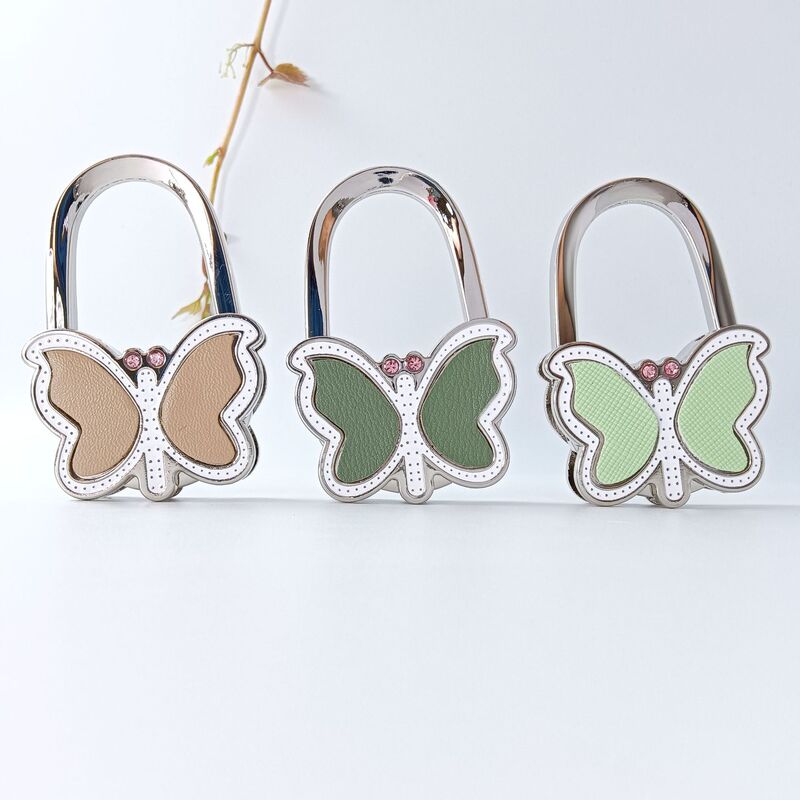 Made in Guangdong, Amazon's best-selling butterfly-shaped adhesive-free foldable table-top bag hook for handbags and purses