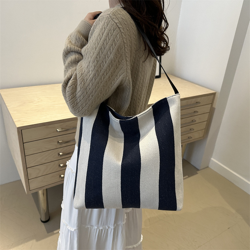 Bolsa de lona de gran capacidad, bolsa de hombro a rayas de mujer, texturas extranjeras, bolsas de compras coreanas, bolsas de tela portátiles.