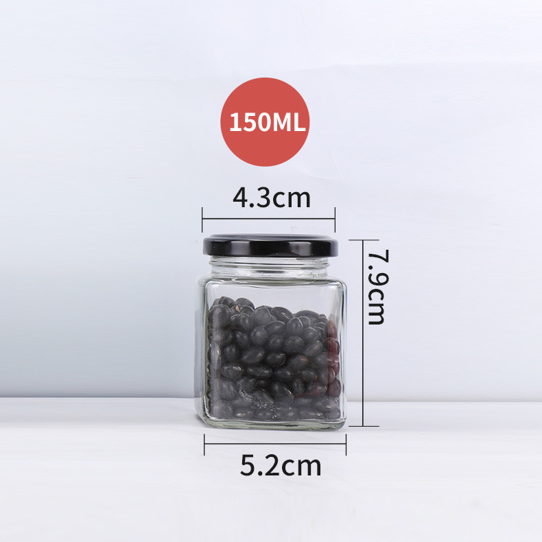 Suministro de botella de vidrio de cuatro bordes sellada transparente cuadrado multi-grano botella de almacenamiento puede botella de miel sub-botella al por mayor