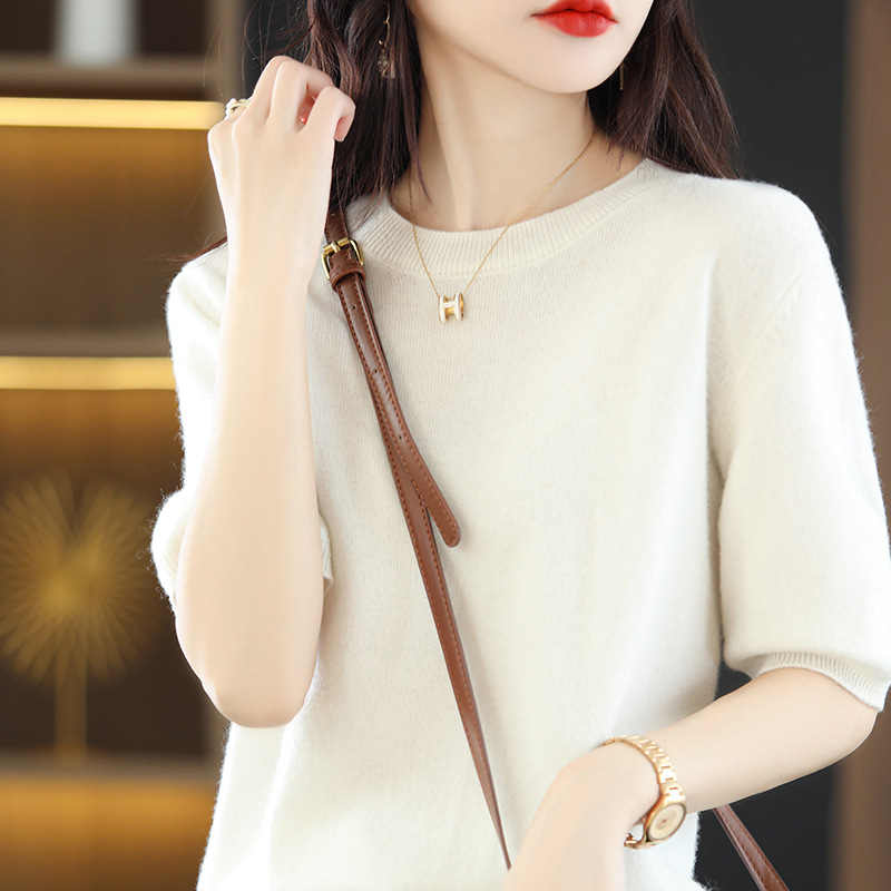 Spring woolen sweater with a round collar