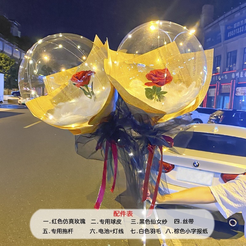 光る夜市の円形の赤い屋台のネットを並べてボールを押して会の風船のイルミネーションの明かりの告白のロマンチックな波の地帯のスーツを押します。|undefined