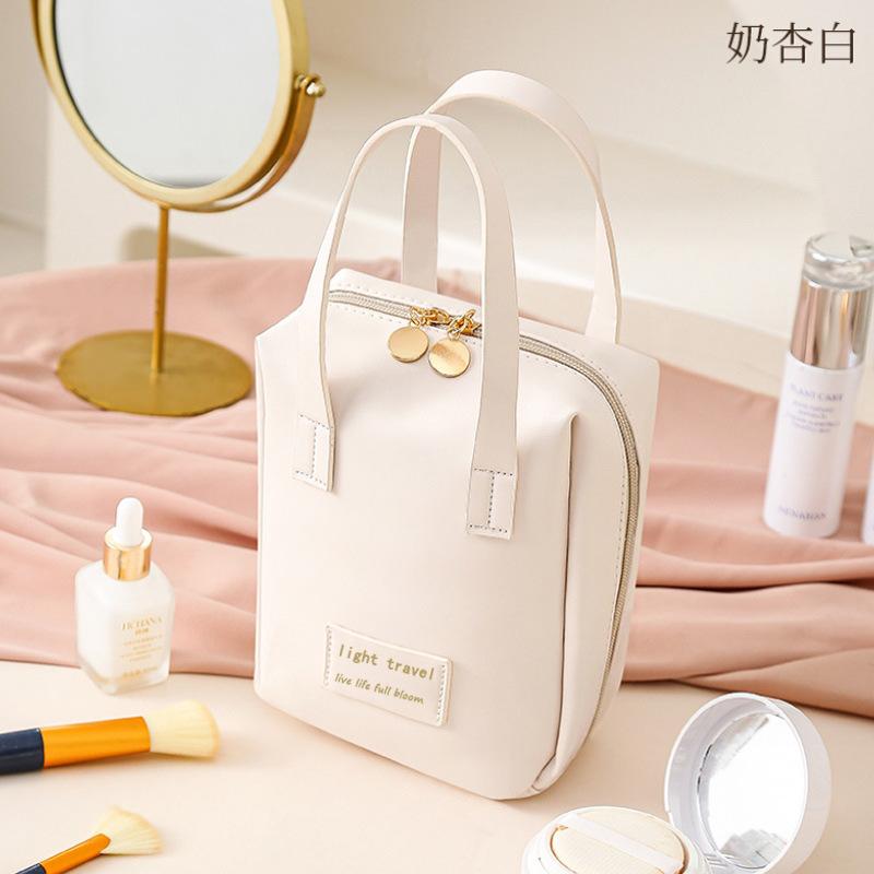 Nueva bolsa de cosméticos portátil de gran capacidad bolsa de almacenamiento de cuidado de la piel maquillaje cepillo de viaje bolsa de lavado bolso de cuero