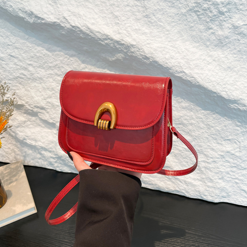 2025 nueva moda temprana primavera bolsa de silla textura casual gran capacidad retrógrada piel de cera de aceite de hombro mochila para mujeres