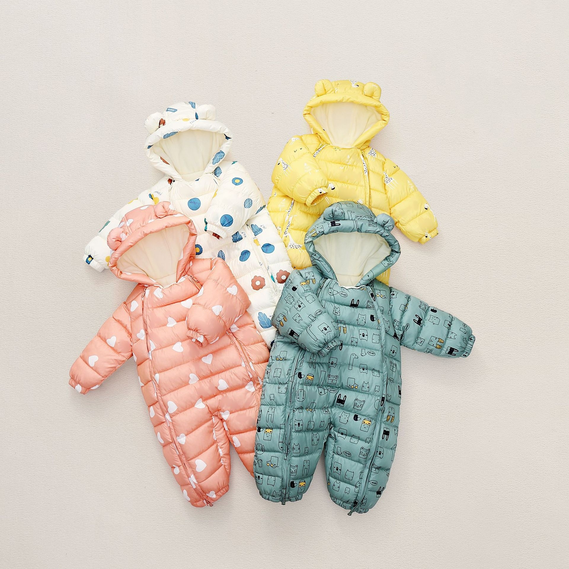 Recién nacido nuevo mono niños y niñas Salida de invierno abajo ropa acolchada de algodón forrada de lana engrosada ropa acolchada de algodón mameluco