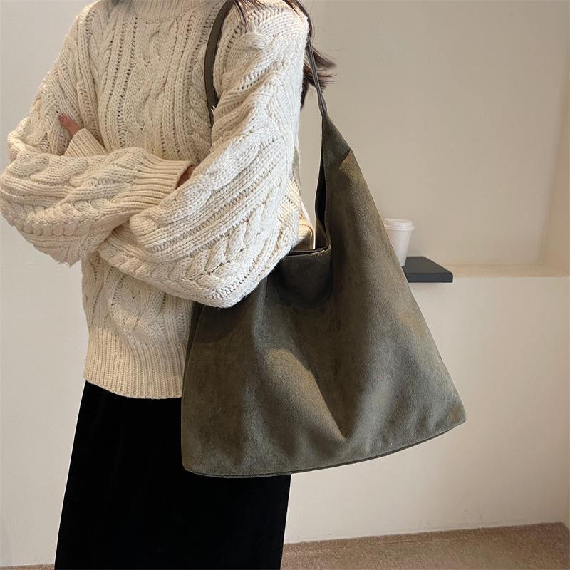 レトロな柔らかい面のスエードのパンの包みの女性の2025新型の春の流行の大容量のショルダーバッグのファッションのバケツの包み|undefined