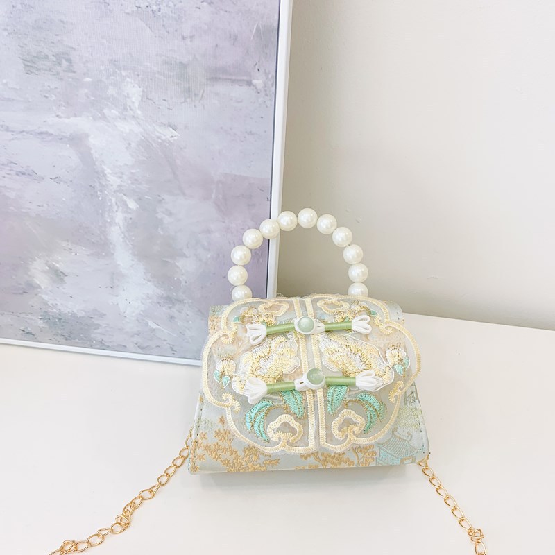 Nuevo estilo chino retro bolso de perla de viento 2025 bolso de cambio sobre rojo bolso de princesa de niñas Hanfu