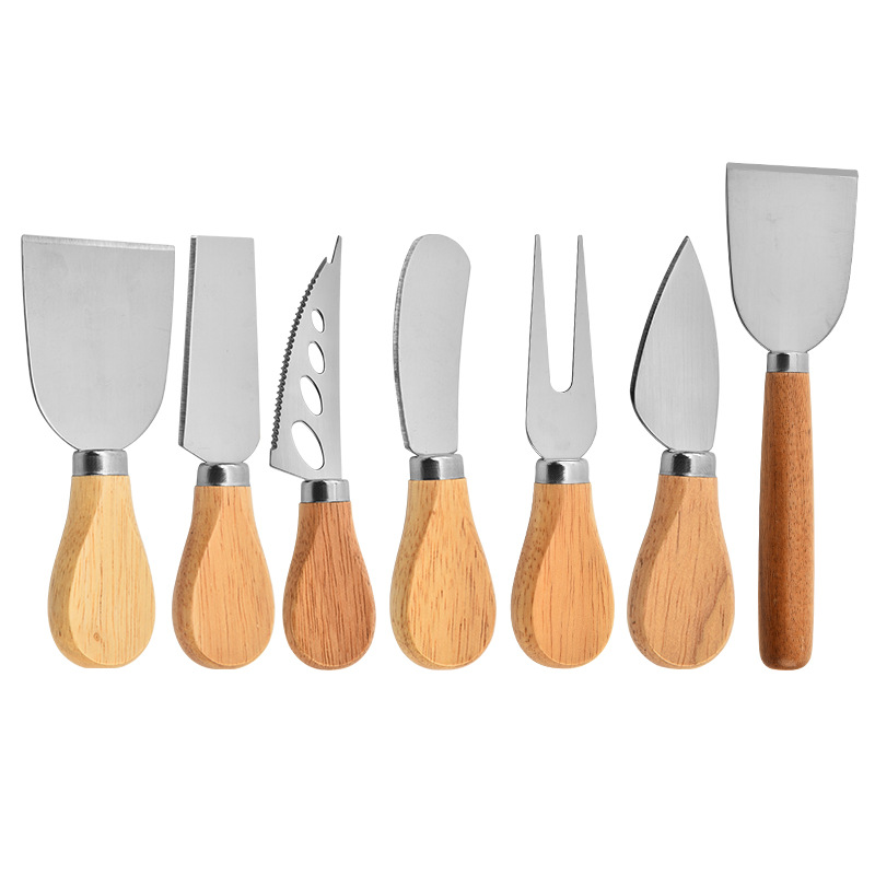 Fabricante de acero inoxidable cuchillo de queso de cuatro piezas conjunto de mango de madera de goma cuchillo de pizza de queso crema tenedor cuchillo de pala