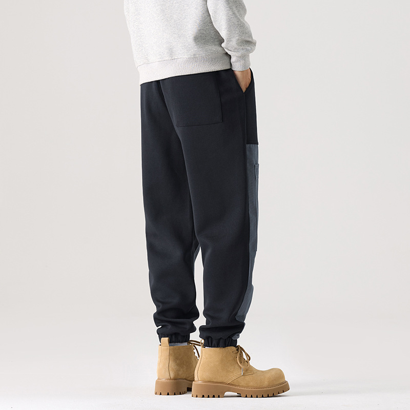 Mick Jones 2025, nuevos pantalones casuales de otoño, pantalones de guardia de hombre, pantalones grandes, pantalones de moda con etiquetas colgantes.