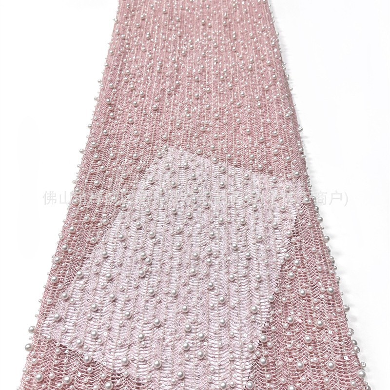 Tejido de malla de perlas hechas a mano de alto grado ondulado vertical tridimensional bordado de perlas vestido de boda tela de diseño