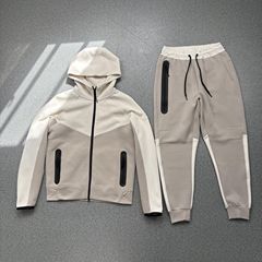 スポーツand leisure日程春と秋の新型帽子付きコートのゴム付きズボンのスポーツとレジャーセット