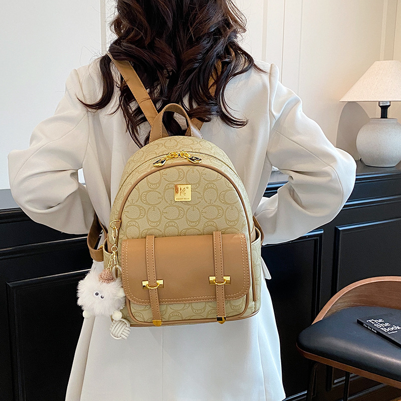 双肩包女2025夏季新款简约流行撞色质感皮质时尚洋气女孩旅行背包