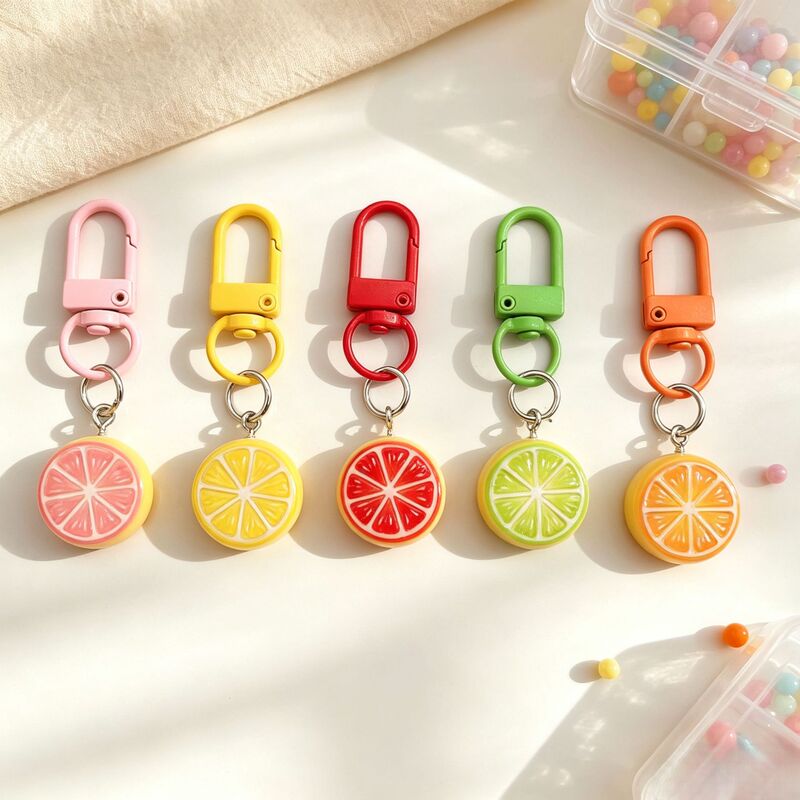 Cute and fresh-looking artificial lemon fruit slice keychain, a lovely accessory for bags and backpacks, perfect as a gift for best friends Cute and fresh-looking artificial lemon fruit slice keychain, a lovely accessory for bags and backpacks, perfect as a gift for best friends