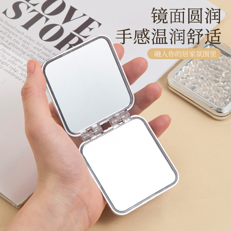Double-sided small mirror