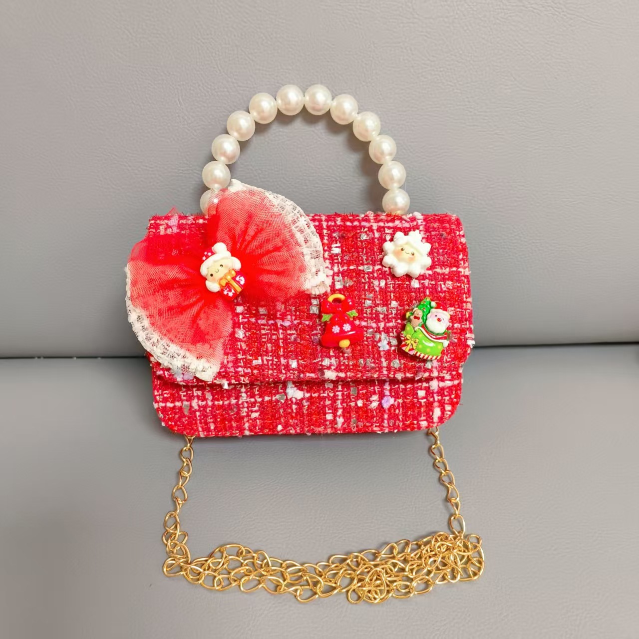 Cartera de Año Nuevo rojo arco de papá Noel bolso de perla pequeña cadena de viento fragante bolso de hombro