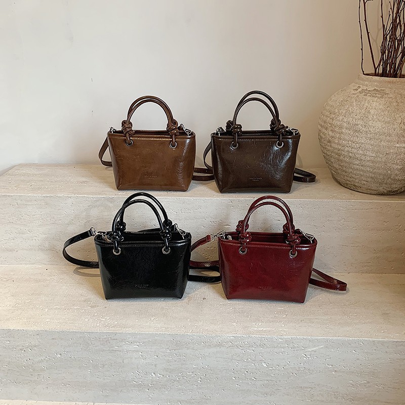 Transfronterizo mayorista otoño invierno retro bolso 2024 nueva moda pu bolso de cubo bolso de nicho universal bolso de mujer