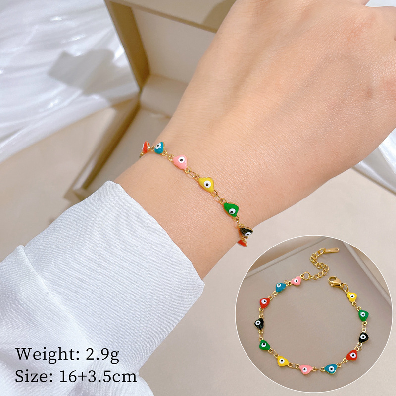 Pulsera minimalista de acero de titanio con ojo de color, estilo retro femenino