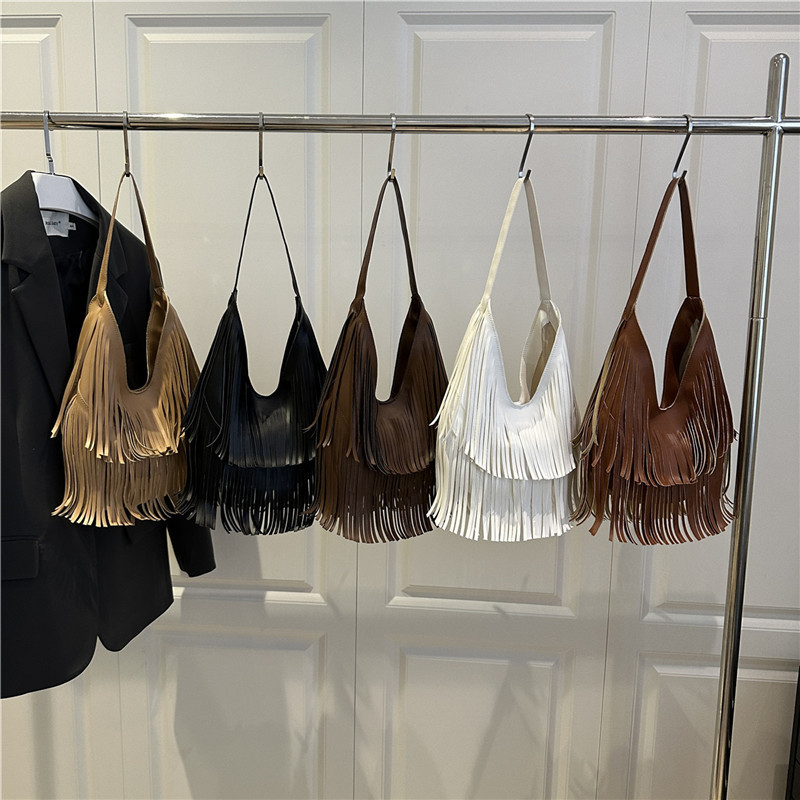 Wholesale Niche Light Luxury Hand-Held Crescent Bag Women's Bag 2025 Summer New Tassel Versatile Shoulder Bag Commuter Armpit Bag