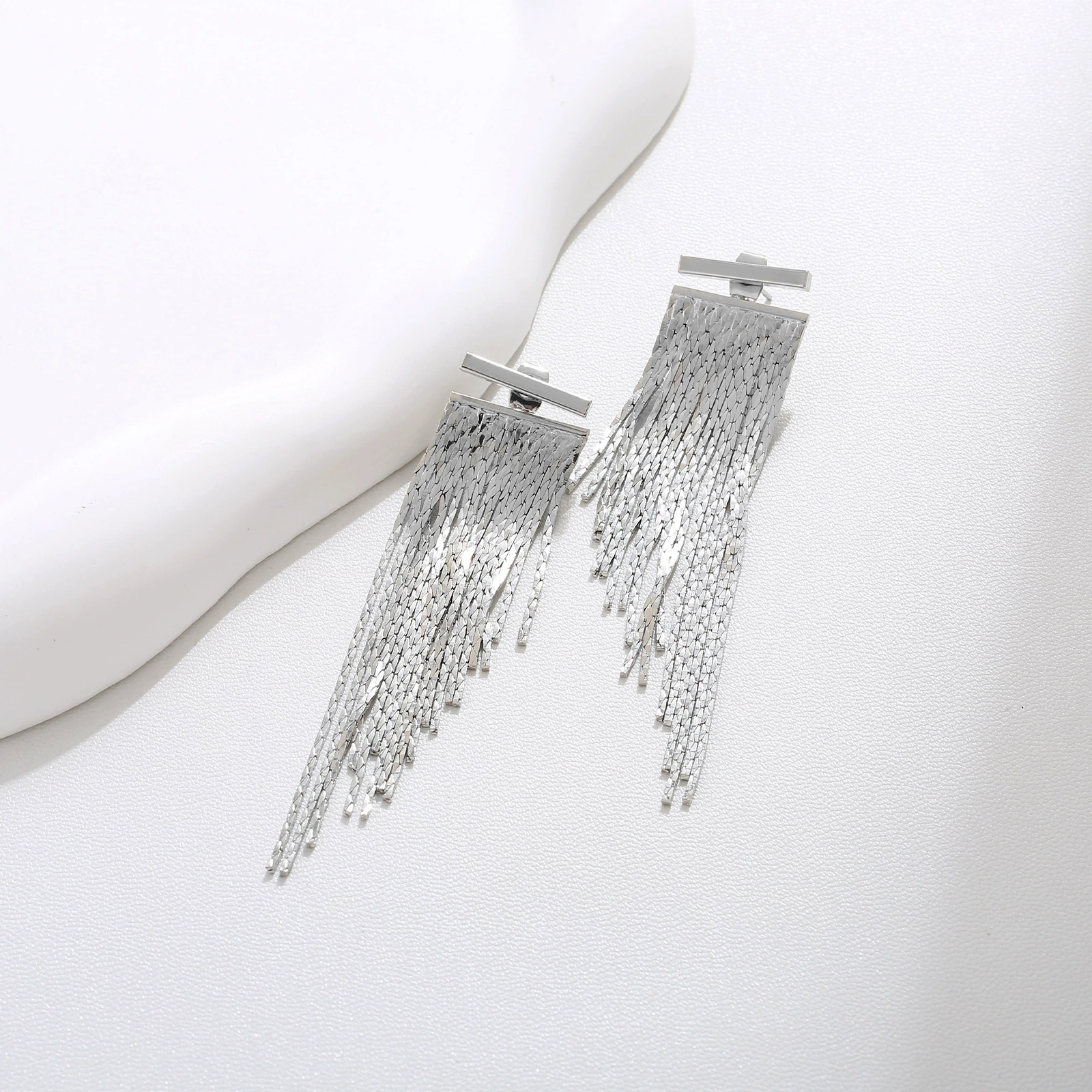 Earrings, bangs with tassels
