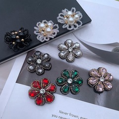 New handmade beaded, sequined, and rhinestone flower—simple pearl floral DIY accessory pieces for shoes, hats, and hat flowers.