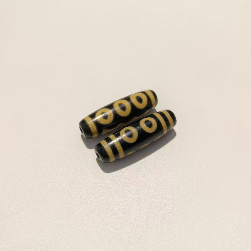 メーカー歯黄包糊九眼12 × 38mm天珠歯黄風化古法包糊瑪瑙天珠【a級】|undefined