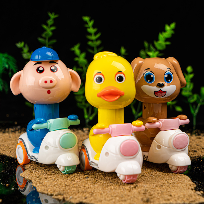 Presione pollos perros cerdos ganado panda dibujos animados inercia retroalimentación motocicleta juguetes para niños estand de suministro al por mayor pato amarillo