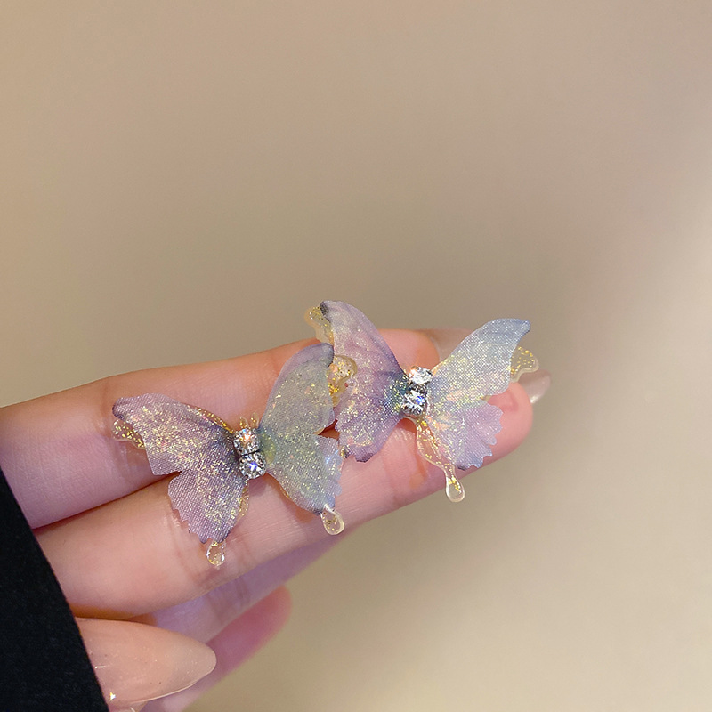 Pendientes de borla de flor de súper hada de plata Pendientes de ins pequeños frescos y dulces Personalidad de moda Pendientes de alta gama al por mayor