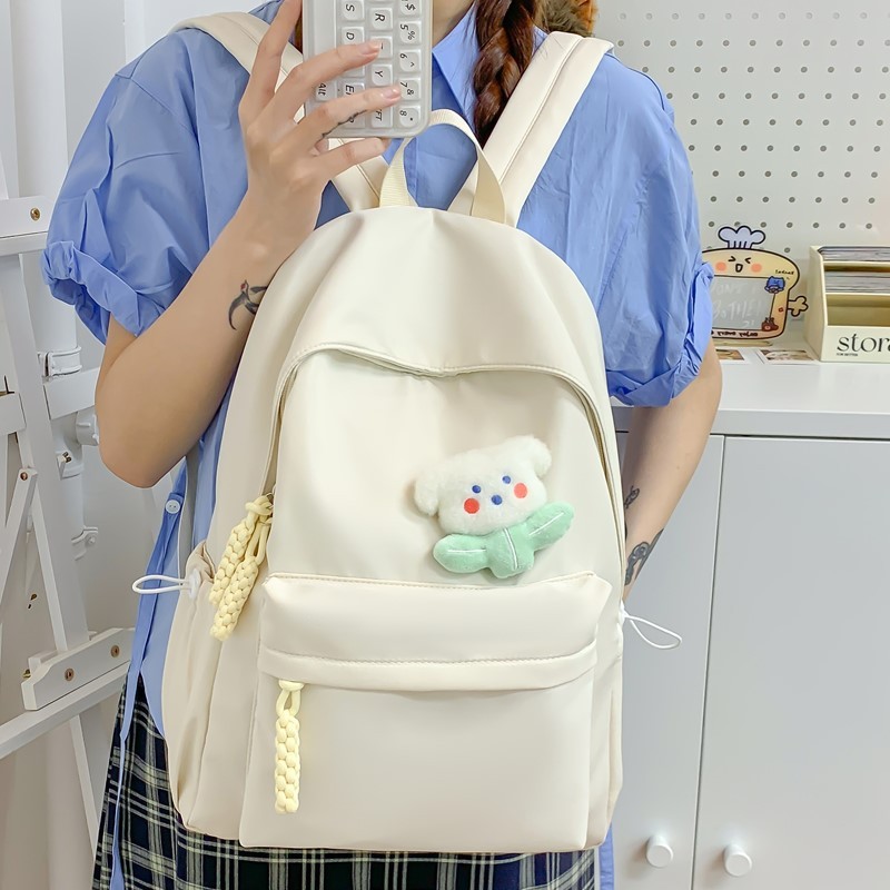 书包女生初中生纯色简约百搭设计感日系高中生女大学生双肩包批发|undefined