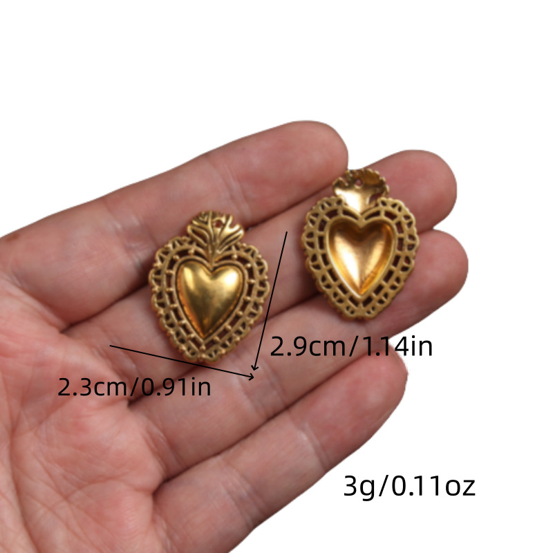 Transfronterizos 10 estilos de oro antiguo colorado colgante de aleación del corazón sagrado DIY encanto joyería accesorios metálicos