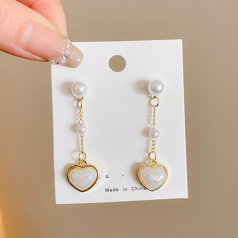 Pendientes de perlas, pendientes de estilo caliente, lujo ligero, pendientes simples de celebridades de Internet, accesorios de Yiwu, venta al por mayor
