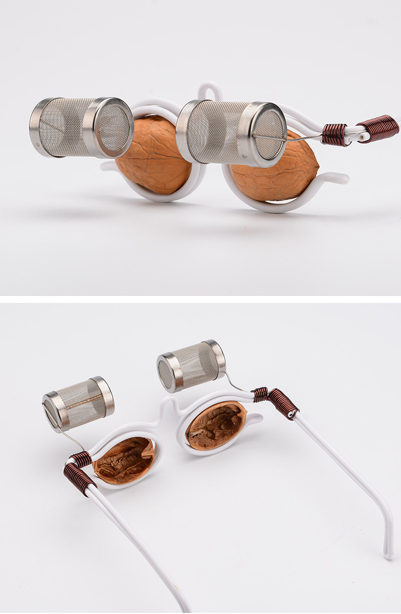 Walnut Moxibustion Eye Frame Stainless Steel Eye Area Moxa Device with Smokeless Moxa Cones for Home Use in use