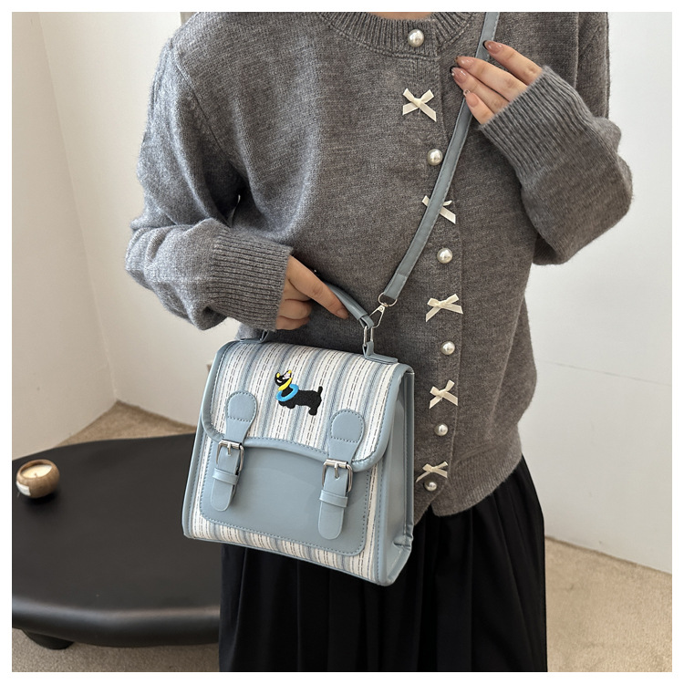 The new backpack for the autumn of 2024 is a fashionable and simple hand-held student single-shoulder bag with a checkered lid and a retro crossbody style undefined