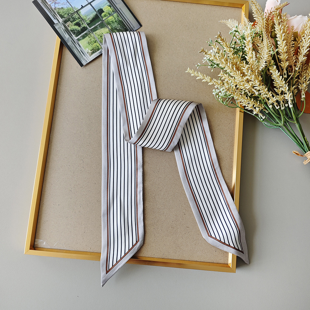 Bufanda de seda larga pequeña a rayas blancas y negras retro 2025 nueva moda francesa alta sensación de temperamento bufanda bufanda accesorios