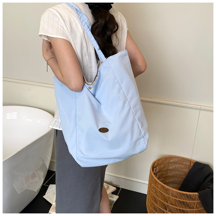 ins Korean-style laid-back single-shoulder bag, casual large-capacity black and white checkered tote bag, student commuting backpack for classes undefined