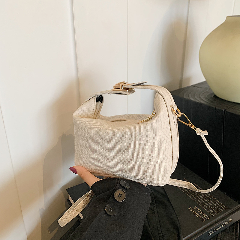 Bolsa de mano a rayas de moda coreana para mujeres otoño / invierno 2024 nuevo estilo simple bolso de hombro personalizado gran capacidad mochila