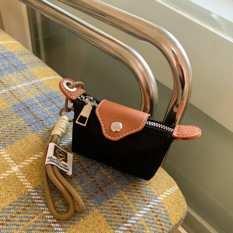 Moda coreana de almacenamiento bolsillos de cambio nuevo bolso portátil auricular bolso lindo mini 2026 bolso de lápiz labial para mujeres
