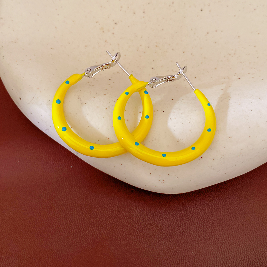 Aguja de plata amarilla goteo de aceite punto de onda aretes redondos simple moda aretes ligeros de lujo alta sensación de aretes al por mayor