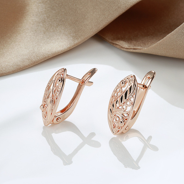Demi-season golden earrings heart shaped