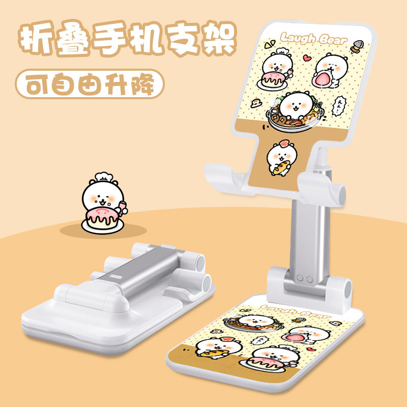 Kt猫の漫画の携帯電話の支柱はタブレットの怠け者のデスクトップの新型の生放送のネット課の神器のベッドの頭の折り畳みの支柱を適用します。|undefined