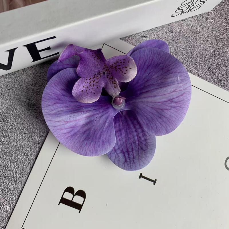 絹布の胡蝶蘭の花の頭は花の壁の部品の花の材料の頭をシミュレーションして髪を飾ってdiyの手作りの結婚祝いの贈り物を挟んで造花を飾ります。|undefined