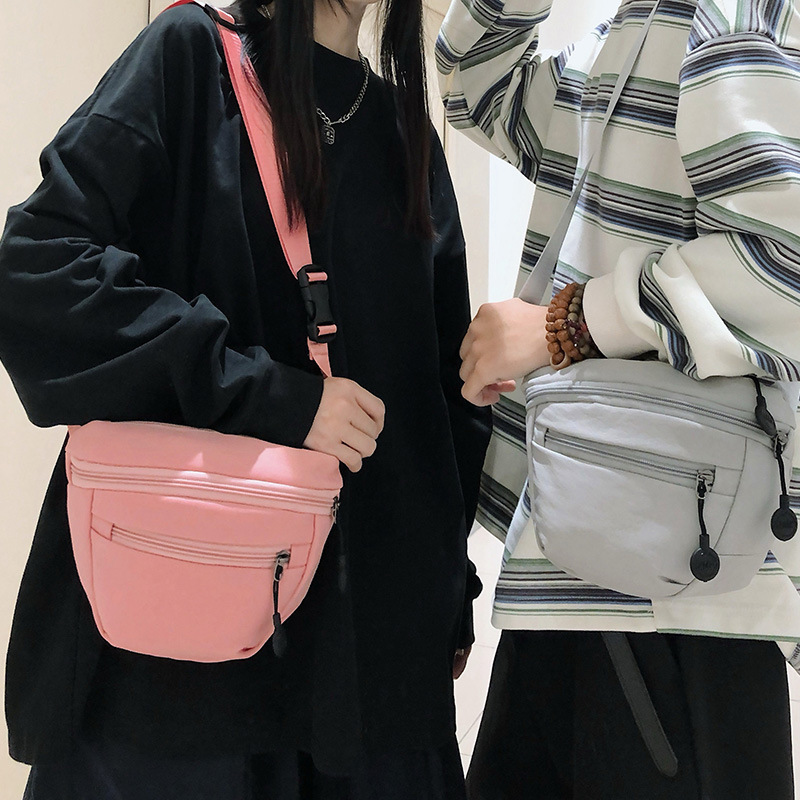 跨境简约时尚斜挎包女尼龙休闲百搭单肩包户外运动手机包情侣胸包