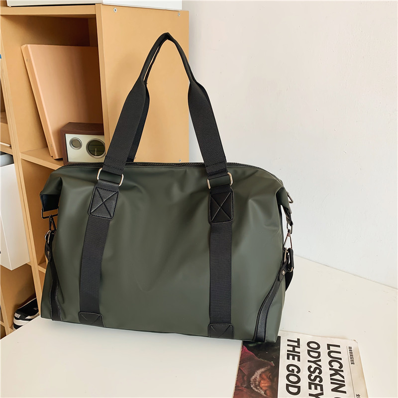 Nuevo bolso de viaje de color sólido, bolso de yoga de mano de gran capacidad, bolso de ocio, bolso de ejercicio, bolso de viaje corto.