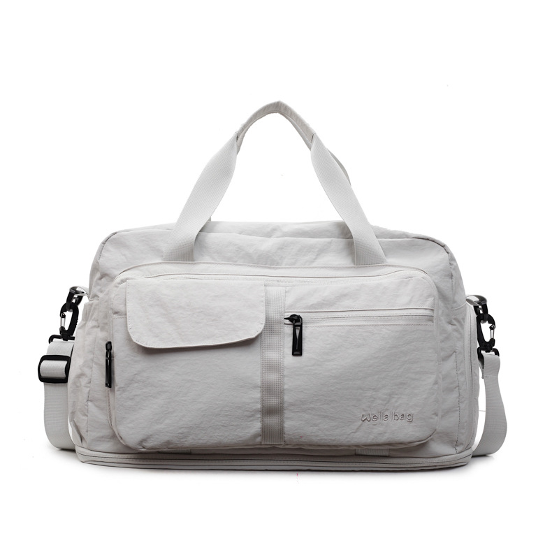 Bolsa de viaje de corta distancia portátil transfronteriza nueva bolsa de almacenamiento portátil de gran capacidad bolsa de yoga de fitness al aire libre bolsa de lona mujer