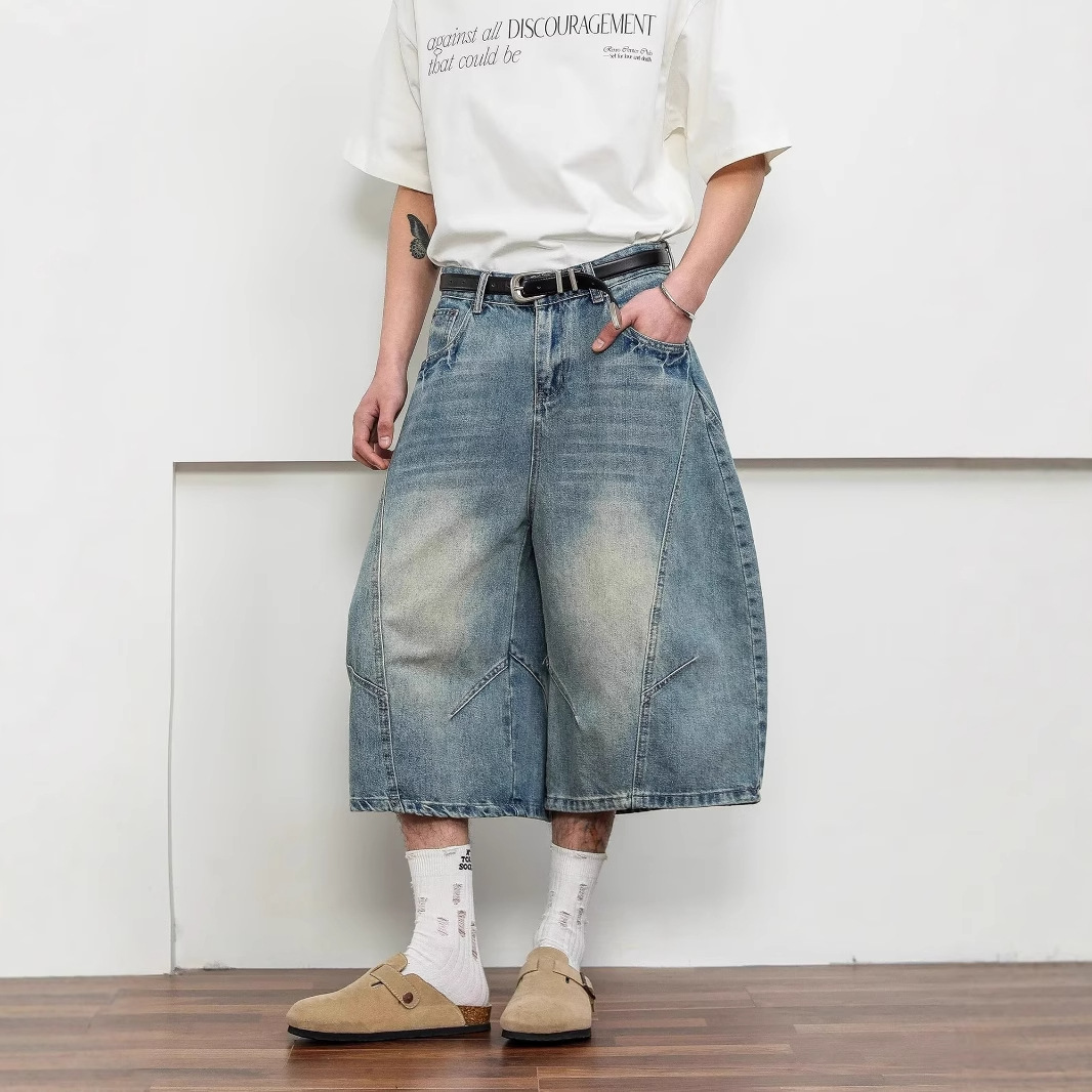 美式街头复古水洗裂纹弯刀七分牛仔裤男女宽松阔腿嘻哈炸街短裤子