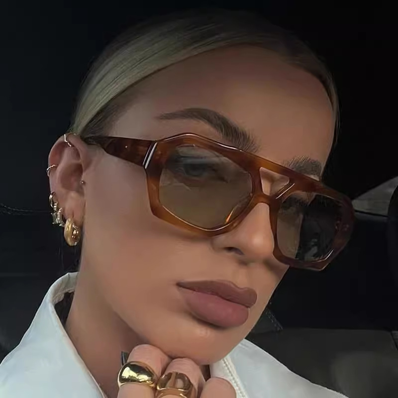 Nuevas gafas de sol de estilo europeo y americano de Raine, gafas de sol de moda con doble puente y montura grande para mujer, gafas de sol de protección solar transfronterizas.