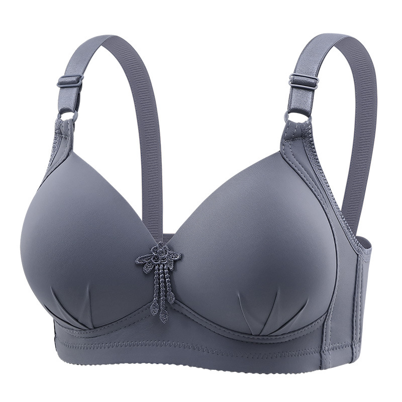 Las mujeres de mediana edad, grandes y delgadas tazas de ropa interior se reúnen, grandes y sin anillos de acero, levantan y sostienen sujetadores de leche complementarios cómodos y transpirables.