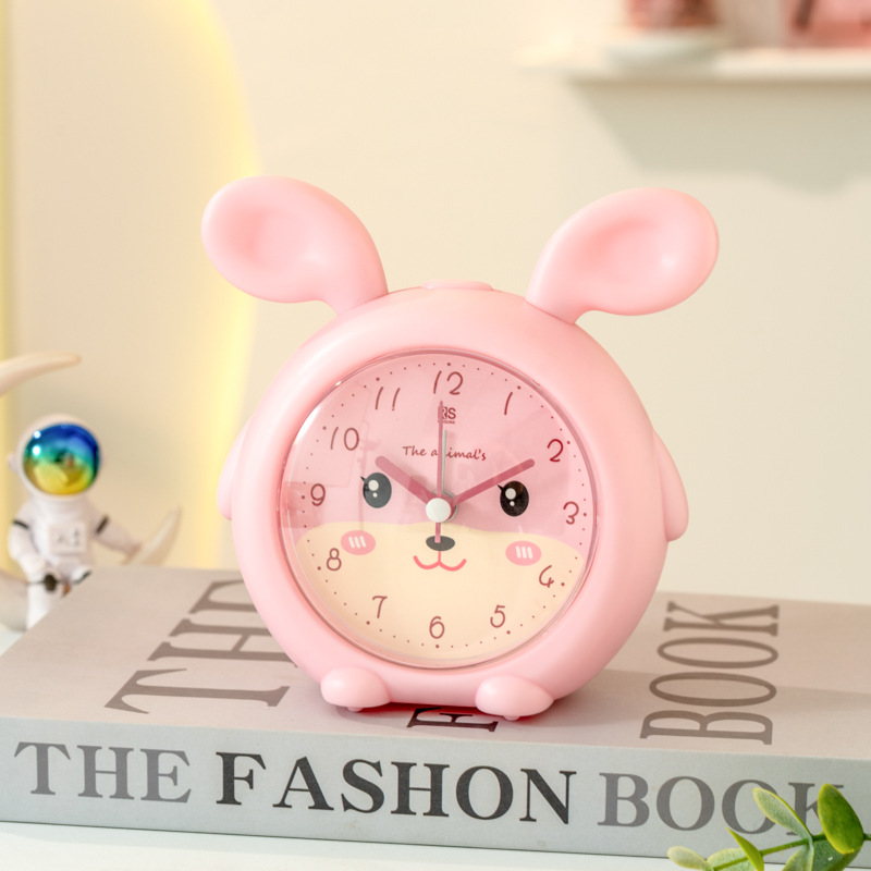 Fábrica directa lindo despertador de dibujos animados color caramelo silencioso con luz despertador para estudiantes WenChuang especial pequeño reloj despertador