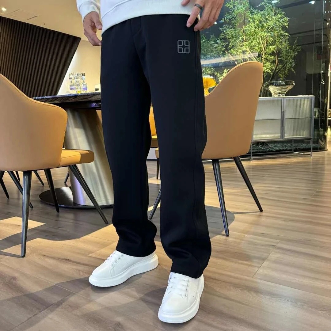 Primavera y otoño pantalones juveniles para hombres 2025 nuevos pantalones casuales rectos sueltos otoño y invierno con pantalones deportivos de lana
