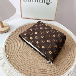 Niche fabric cosmetic bag large capacity high-looking portable storage bag clutch European and American Retro women's bag zipper bag