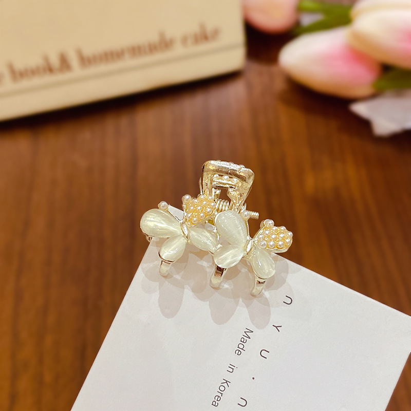 Ojo de gato doble mariposa-perla